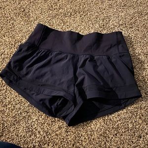 Lululemon high waisted navy shorts. 2.5-3 inseam. Not long. Size 6.